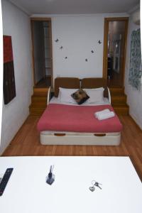A bed or beds in a room at Estudio Nueva Numancia