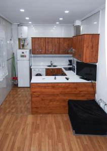 A kitchen or kitchenette at Estudio Nueva Numancia