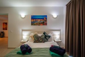 Ένα ή περισσότερα κρεβάτια σε δωμάτιο στο Palapa Beach Paradise