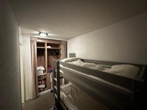 Krevet ili kreveti na sprat u jedinici u okviru objekta Appartement Brulaz, Les Contamines-Montjoie à 200 m des télécabines