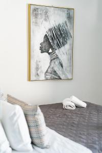 Ein Bett oder Betten in einem Zimmer der Unterkunft New Paradise Beach Resort - Adults only