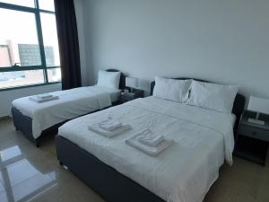 Postel nebo postele na pokoji v ubytování Granada Apartments Marina Crown