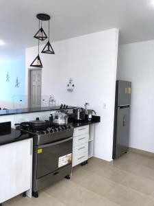 Dapur atau dapur kecil di Villas Playa Blanca