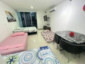 Postel nebo postele na pokoji v ubytování Disfruta hermoso apartaestudio