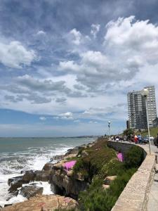 a view of the ocean from a beach at Amplio Departamento en Zona Gastronómica a una cuadra de la Playa in Mar del Plata