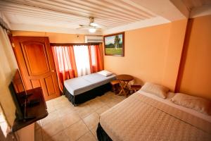 Postel nebo postele na pokoji v ubytování Hotel BAHÍA + 37 fotografií