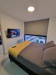 Postel nebo postele na pokoji v ubytování Apartamentos Bauerle Curitiba