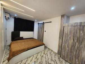 Katil atau katil-katil dalam bilik di The Milton Apartment