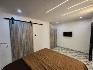 Katil atau katil-katil dalam bilik di The Milton Apartment