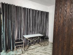 Gambar di galeri bagi The Milton Apartment di Ikeja