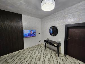 Televisyen dan/atau pusat hiburan di The Milton Apartment