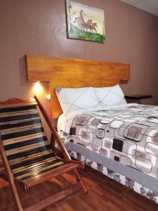 Кровать или кровати в номере hostal restaurante El Fogon Campero
