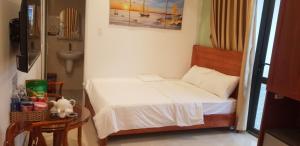 Postel nebo postele na pokoji v ubytování Hostel Luxury Tây Bắc