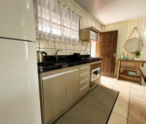 Dapur atau dapur kecil di Hospedagem Aconchego da casa Rosa +29 gambar