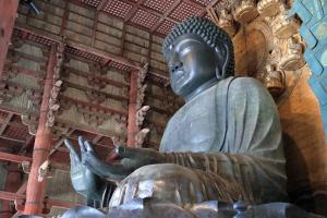 a large statue of a buddha in a building at Iroha Grand Hotel Kintetsu Nara Ekimae in Nara