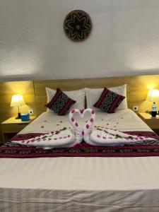 Voodi või voodid majutusasutuse Seaside Hotel toas