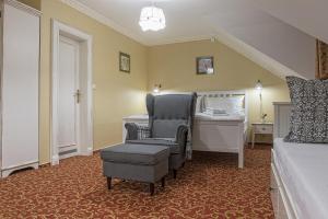 Postel nebo postele na pokoji v ubytování Hotel Pod Bránou