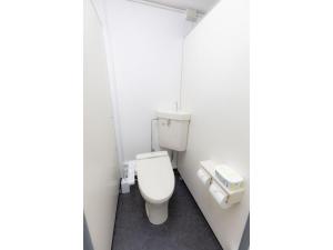 a bathroom with a toilet in a white room at Guest House Goto Times - Vacation STAY 59210v in Goto +29 photos