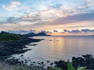 a view of a body of water at sunset at Guest House Goto Times - Vacation STAY 59209v in Goto
