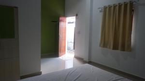 Кровать или кровати в номере Maria Guesthouse