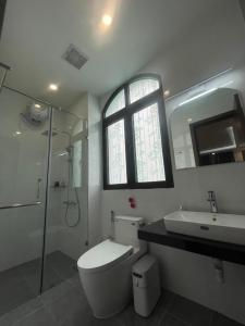 Koupelna v ubytování Homestay the SUN - GrandWorld Phú Quốc + 9 fotografií
