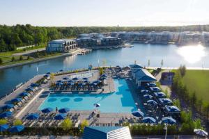 an aerial view of a resort with a large swimming pool at Friday Harbour resort apartment in Innisfil