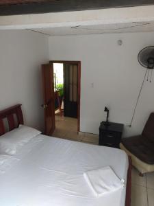 En eller flere senger på et rom på Casa de Campo El Regalo
