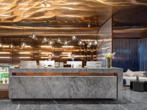 Fotografie z fotogalerie ubytování Echarm PLUS International Hotel Zhujiang New Town Wuyangcun Metro Station - Free Deliver Service to Canton Fair Complex During Canton Fair Period v Kantonu