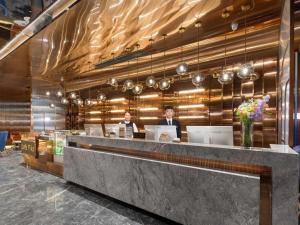 Fotografie z fotogalerie ubytování Echarm PLUS International Hotel Zhujiang New Town Wuyangcun Metro Station - Free Deliver Service to Canton Fair Complex During Canton Fair Period v Kantonu