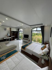 Postel nebo postele na pokoji v ubytování Homestay the SUN - GrandWorld Phú Quốc