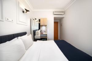 Postel nebo postele na pokoji v ubytování Elan Hotel Istanbul Pera