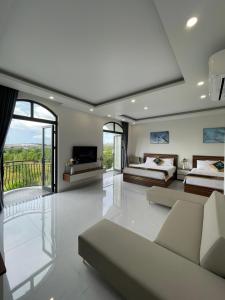 TV a/nebo společenská místnost v ubytování Homestay the SUN - GrandWorld Phú Quốc