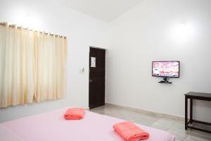 TV a/nebo společenská místnost v ubytování Hill Top Nest + 12 fotografií