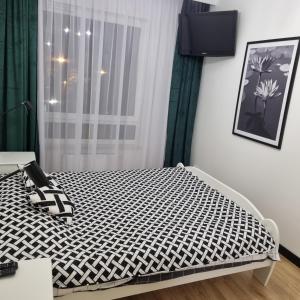 Krevet ili kreveti u jedinici u objektu Komfortowy apartament