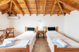 Katil atau katil-katil dalam bilik di Blue Pearl