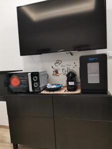 Kuhinja oz. manjša kuhinja v nastanitvi PIGRO House - Bologna Airport Suite
