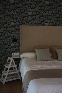 A bed or beds in a room at Cabanas de Udra