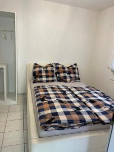 Postel nebo postele na pokoji v ubytování Vida Real Estate Feucht