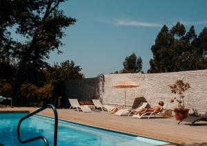 The swimming pool at or close to Cabanas de Udra