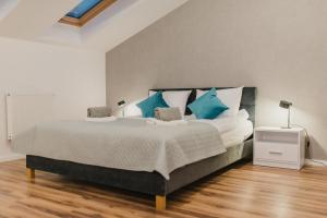 Postel nebo postele na pokoji v ubytování APARTAMENTY PRZY PARKU- Parking GRATIS!!!