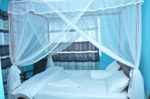 Ein Bett oder Betten in einem Zimmer der Unterkunft Sasiri lanka Room and Apartment