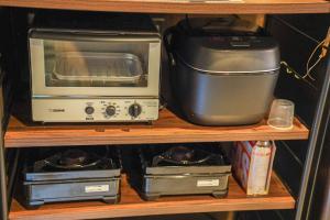 Una cocina o kitchenette en 奥明日香古民家一棟貸し宿 弥栄 Yasaka