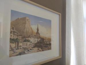 a picture of a painting on a wall at Appartement The View in Dinant