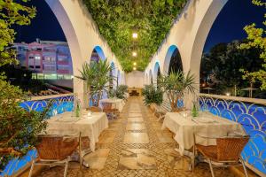 Un restaurante o sitio para comer en Clube Vilarosa