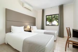 Cama o camas de una habitación en Clube Vilarosa