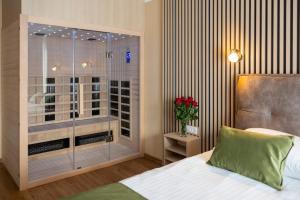 Postel nebo postele na pokoji v ubytování Hotel Dolenjc