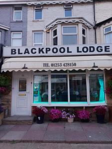 a blackpool lodge sign on the front of a building at Blackpool Lodge in Blackpool