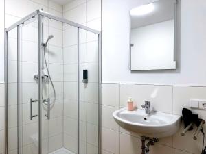 Koupelna v ubytování Schöne Apartments I private Parkplätze I home2share
