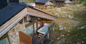 an overhead view of a house with a bath tub at Chalet Jasná Apartment Franco jacuzzi & sauna in Demanovska Dolina