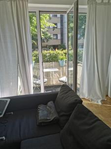 Et sittehjørne på Perfektes Appartement am Düsseldorfer Rhein